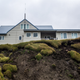 UTQIAGVIK, ALASKA - MONDAY, SEPTEMBER 21, 2017: Anne Jensen, Arctic Anthropologist and Archaeologist with UIC Sciences in Utqiaġvik, examines a house perched atop Ukkuqsi, a rapidly-eroding Inupiat archaeological site located in Utqiaġvik. Photograph: Ash Adams/Gizmodo